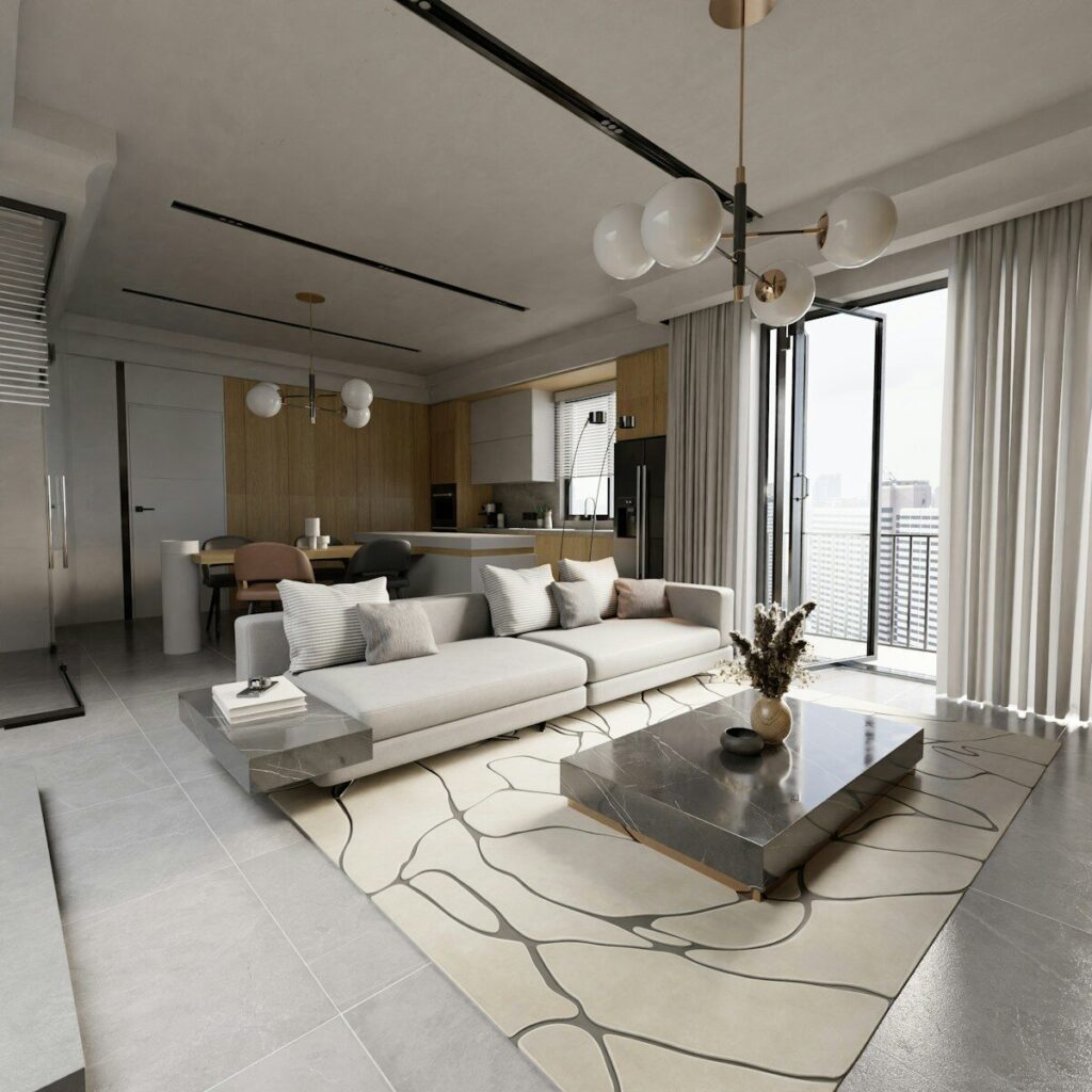 A living room with a couch a table and a large window